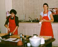 Home Gourmet staff demonstrate cooking techniques